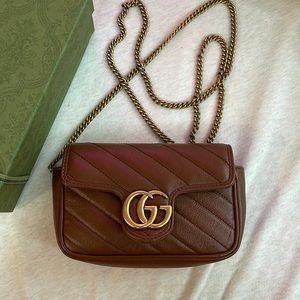 Gucci Marmont matelassé leather super mini bag